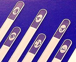 Glass nail files with zodiac symbols.